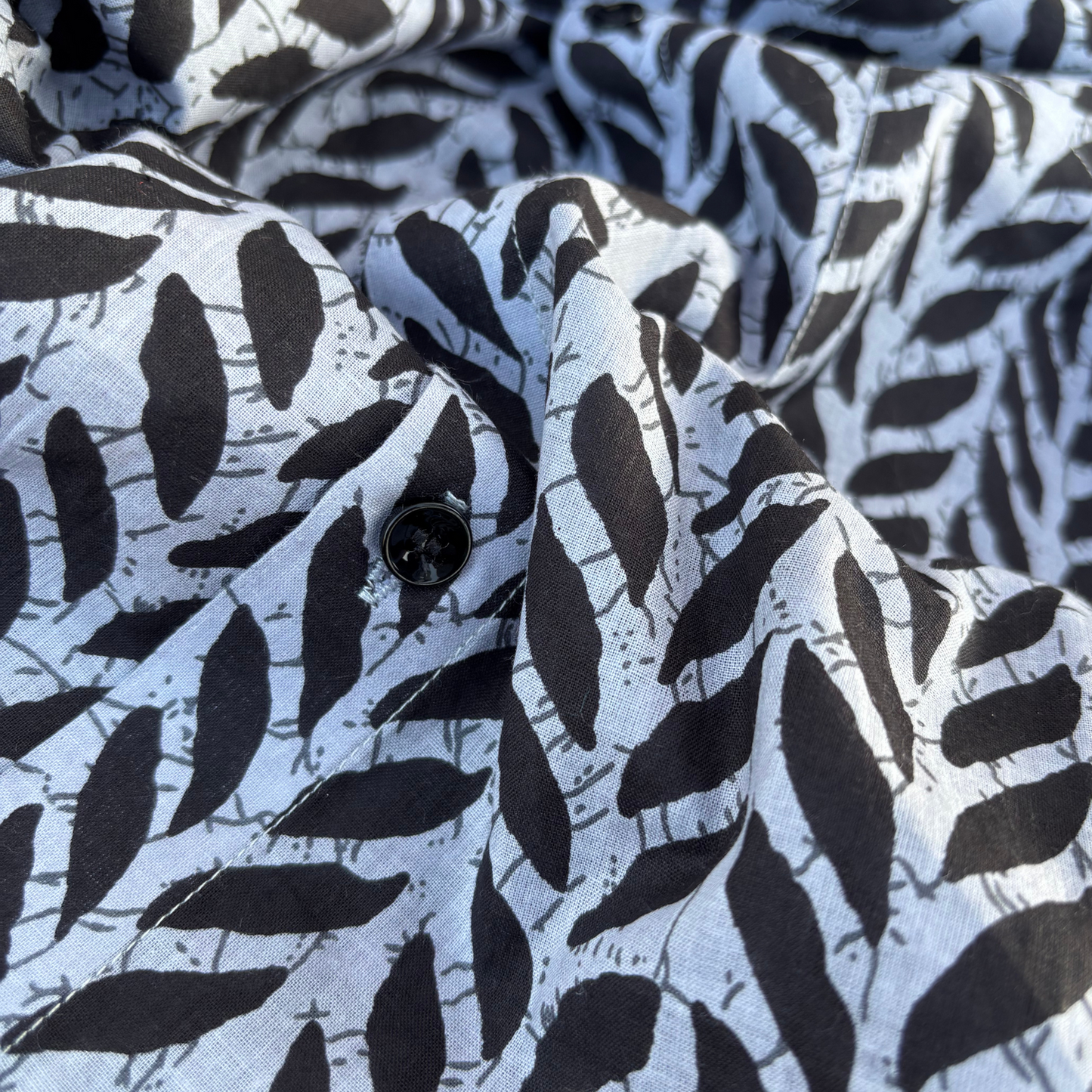 Black Leaf Print on Grey Base