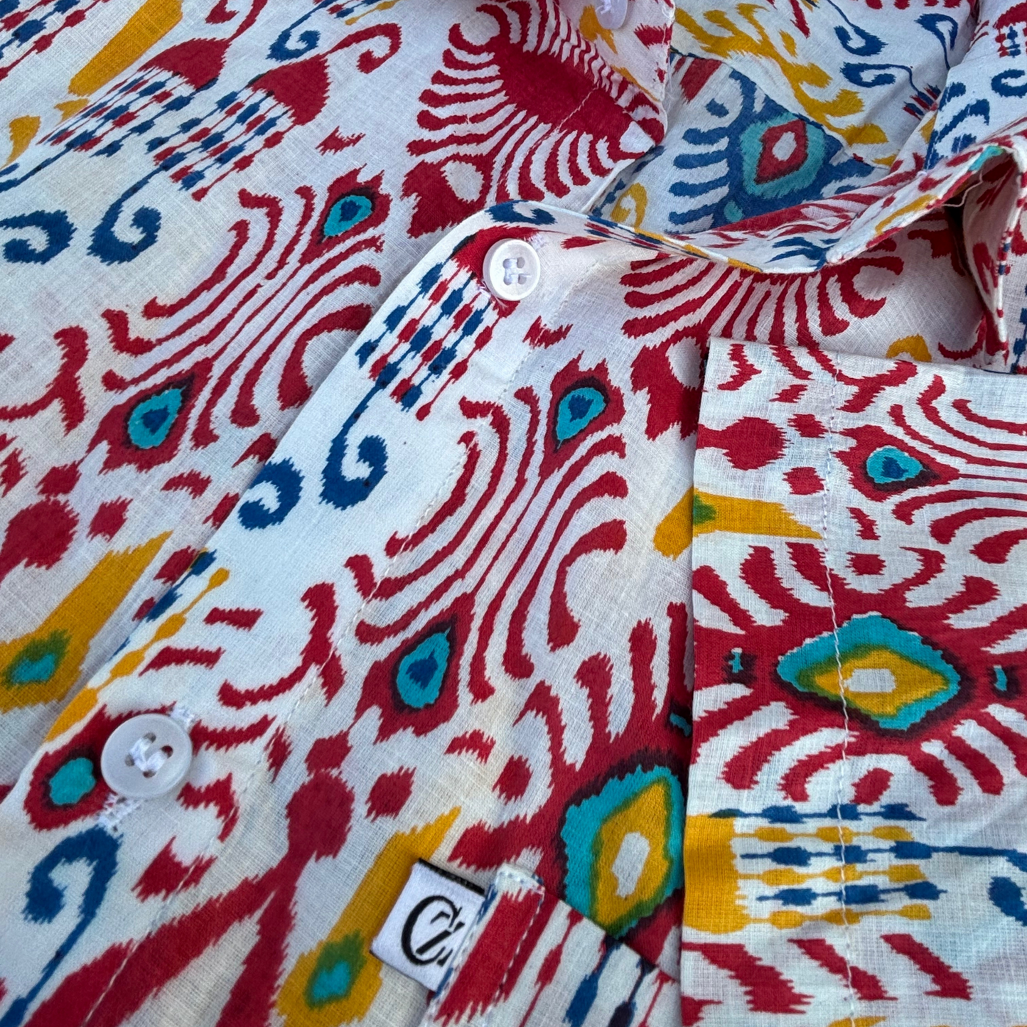 Multicolor Ikat Print (Red, Blue, Yellow on White Base)