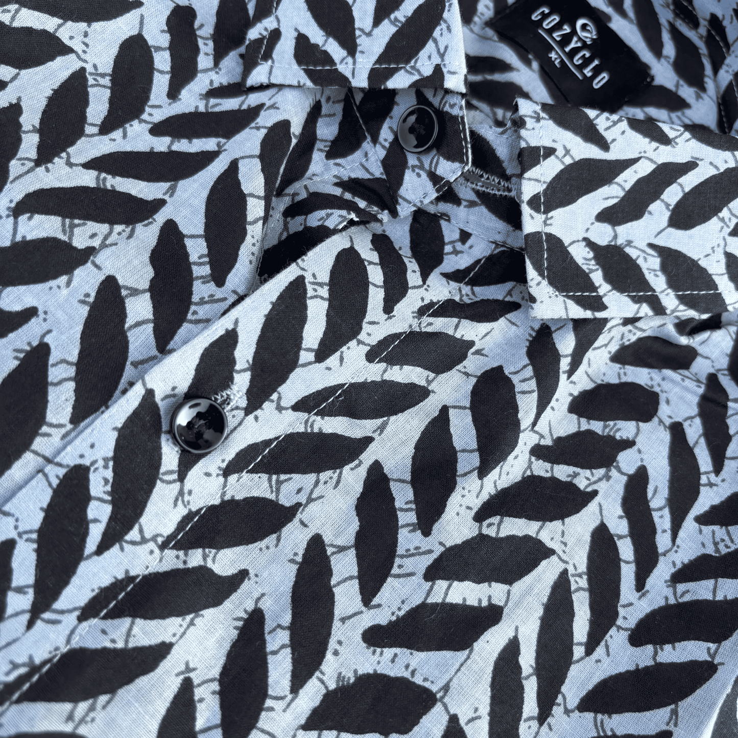 Black Leaf Print on Grey Base